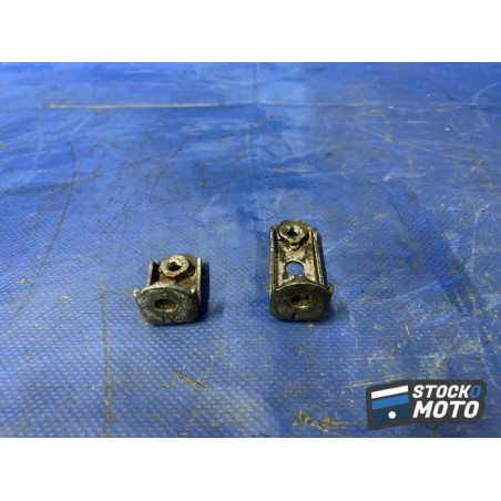 Pattes de fixation sur carter inférieur 